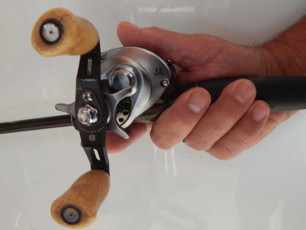 tenue du moulinet casting